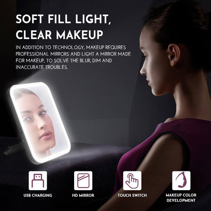 A woman gazes into a well-lit Valga Smart Makeup Mirror displaying her reflection. The image text highlights the features of the Valga Smart Makeup Mirror: "Soft Fill Light, Clear Makeup." Additional features include USB Charging, HD Mirror, Touch Switch, and Makeup Color Development.