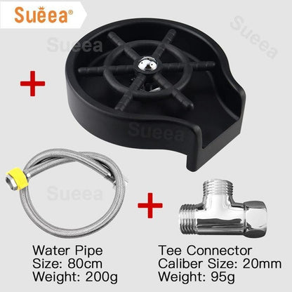 Image showing a Valga Glass Rinser Automatic Cup Washer set, which includes three components. The black rinser features a central nozzle and a tray. The package also contains an 80 cm water pipe with a yellow band, weighing 200g, along with a 20mm tee connector weighing 95g. This set is ideal for use with high-pressure water jets.