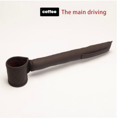 A leather gear shift cover in black with a quilted texture is positioned diagonally on a white background. At the top, the text "coffee The main driving" is displayed in black and red. To complement the sophisticated look of your car interior, consider adding Valga's Leather Car Seat Gap Filler.