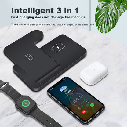 A Valga 3in1 Wireless Fast Charger Dock Station on a marble surface charges an Apple Watch, AirPods, and iPhone simultaneously. A green leaf decor graces the top right corner. Text reads: "Intelligent 3 in 1 - Fast charging does not damage the machine - The ultimate multiple device charging solution for your Apple devices.