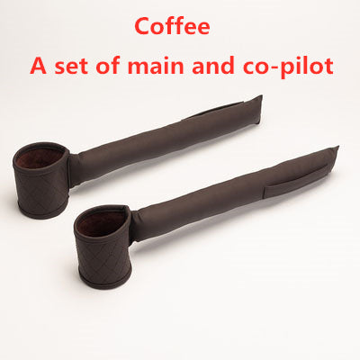 Two long, cylindrical black items with cup-like holders at one end are displayed on a plain white background. The text "Coffee - A set of main and co-pilot" is written in red above the items. These sleek Leather Car Seat Gap Fillers by Valga provide both form and function, keeping essentials within reach.