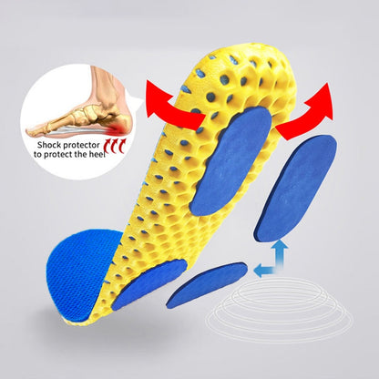 Image of a yellow Memory Foam Insole for Shoes by Valga, featuring blue cushioning pads. Arrows highlight its advanced shock absorption features, particularly the U-shaped heel support. An inset graphic demonstrates heel protection. The removable blue pads are shown against a light grey background.