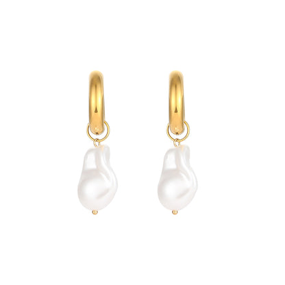 The Water Drop Earrings by Valga feature gold hoops adorned with white, irregular-shaped baroque pearl charms. The pearls' lustrous finish contrasts beautifully with the shiny gold hoops, creating a minimalist and sophisticated design that adds a touch of elegance to any occasion.