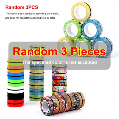 An image showcasing several colorful 3Pcs Magnetic Rings Anti-Stress from Valga, featuring various patterns such as stripes and camouflage. The text reads "Random 3PCS" and "Random 3 Pieces," indicating that three random pieces will be sent. These vibrant rings add an anti-stress element to your tasks. Note: Specific colors cannot be requested.