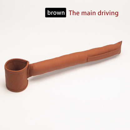 A Valga Leather Car Seat Gap Filler in brown PU leather features a convenient armrest organizer for vehicles, complete with a cup holder and side pocket. The main driving text "brown" is prominently displayed above the organizer.