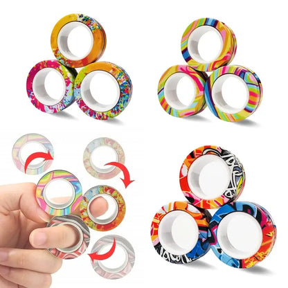 Three sets of the Valga 3Pcs Magnetic Rings Anti-Stress are shown. The top left set features orange, blue, and red patterns. The top right set boasts rainbow patterns. The bottom right set combines blue and red designs. A hand is seen spinning the anti-stress rings on fingers, demonstrating their use as a fidget spinner.