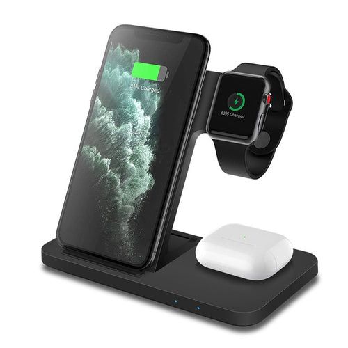 The Valga 3in1 Wireless Fast Charger Dock Station, in sleek black, features a 15W Fast Wireless Charger with an iPhone displaying a charging symbol. It simultaneously charges an Apple Watch and a pair of AirPods in their case placed below. This multiple device charging solution includes blue indicator lights on the base of the stand.